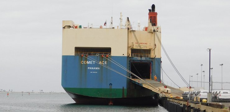 A vehicle carrier ship at port